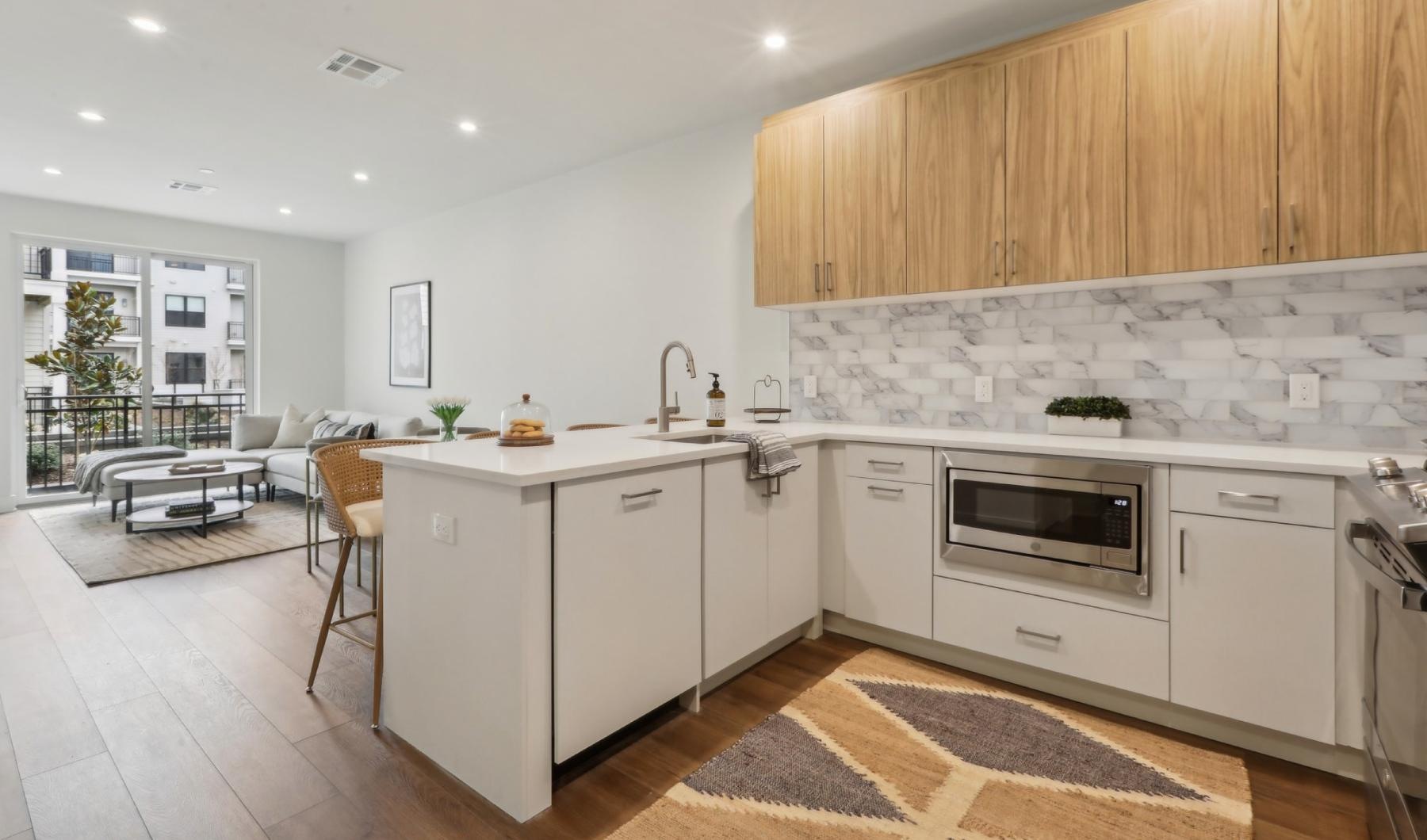 a kitchen with white cabinets