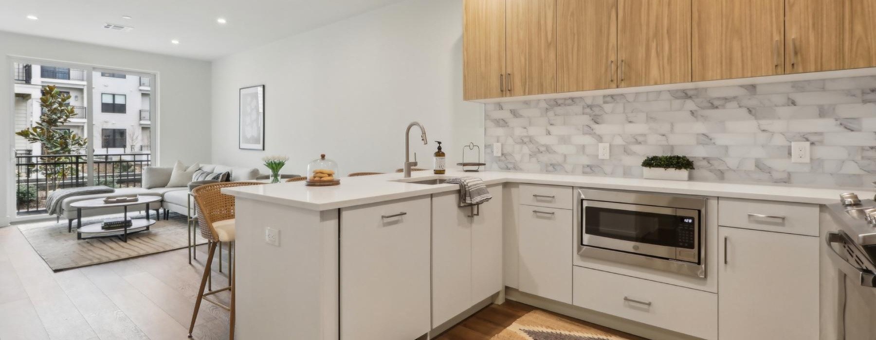 a kitchen with white cabinets