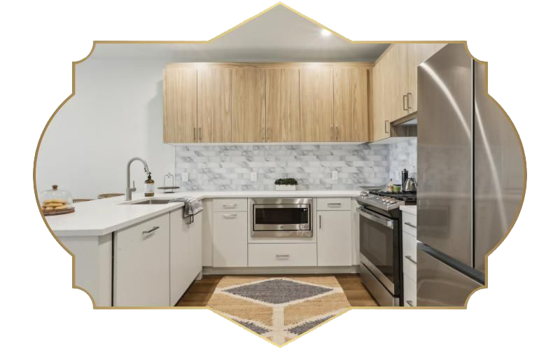 a kitchen with white cabinets
