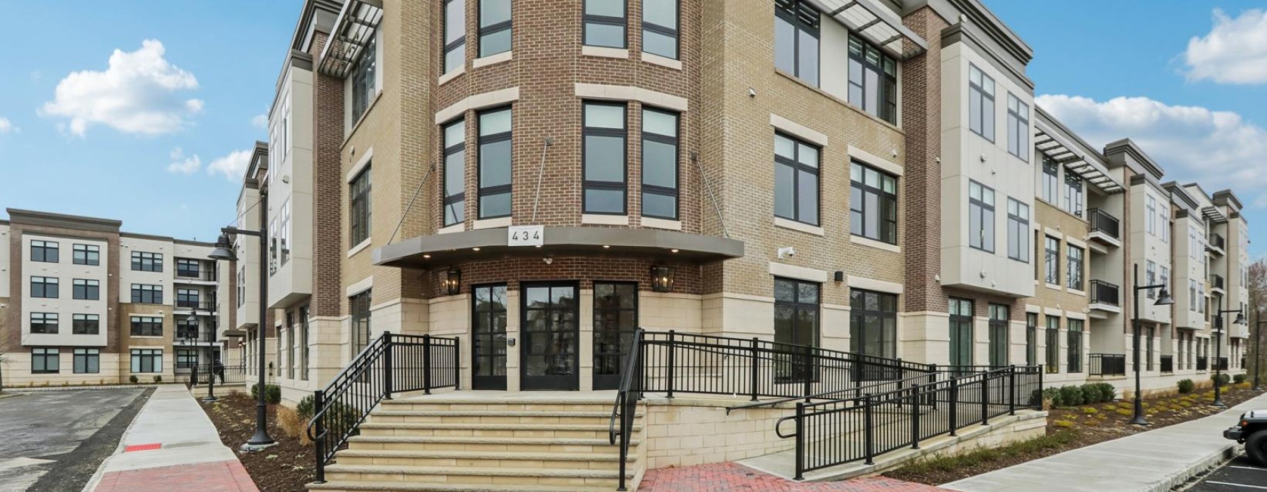 a building with a brick walkway